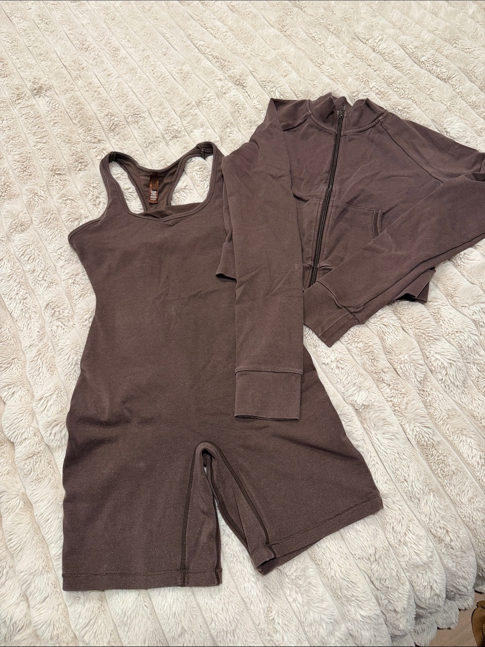 Skims outdoor romper and zip up set
